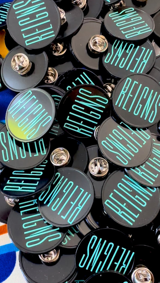 REIGNS Badge
